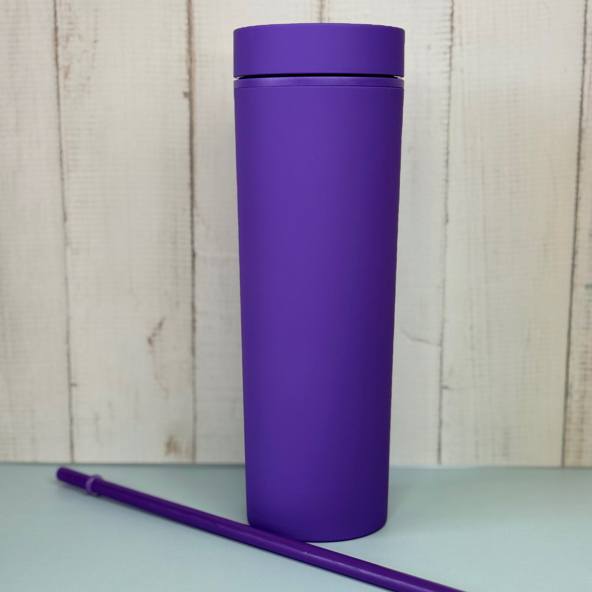 Purple cold coffee cup with matching straw