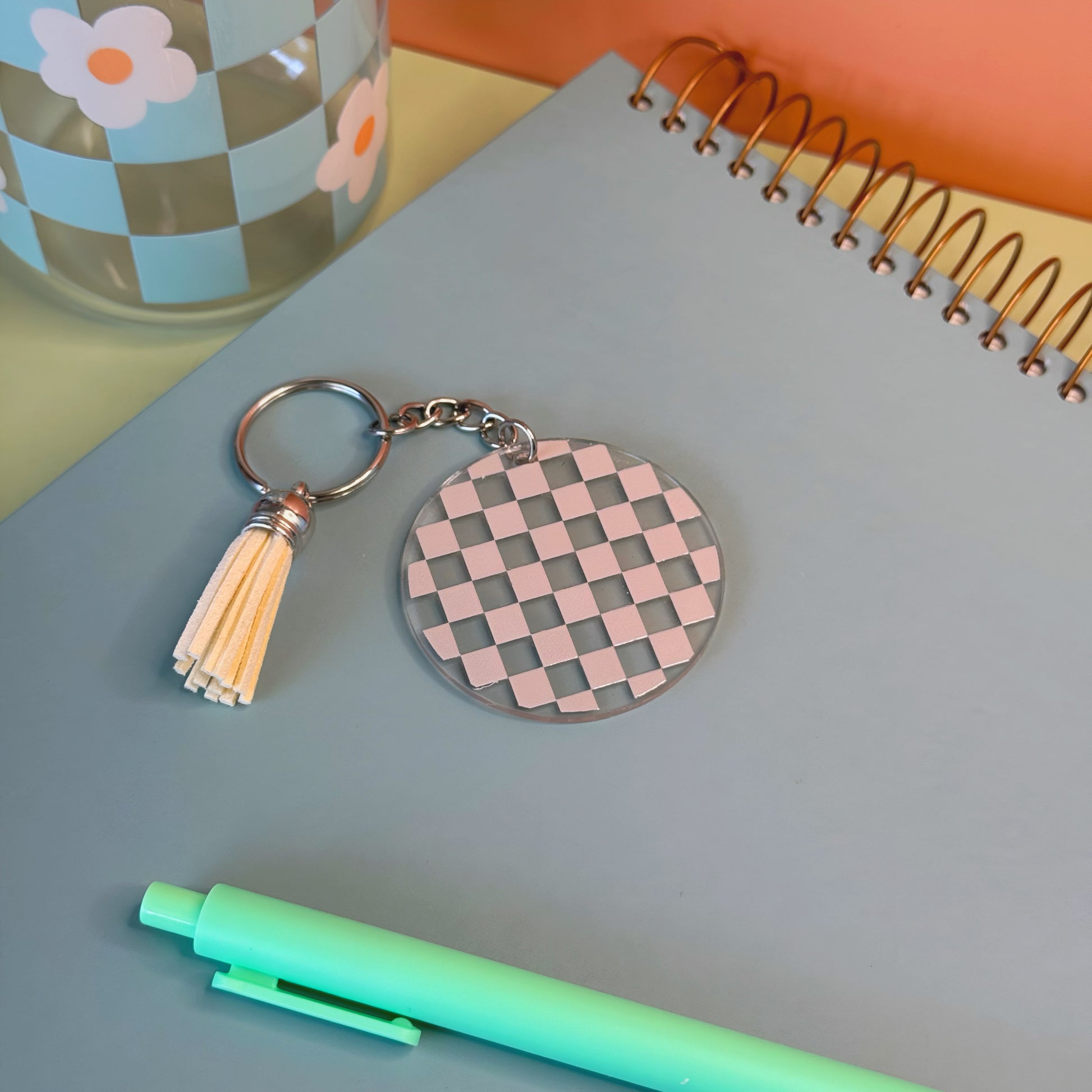 beige checkered keychain or backpack charm